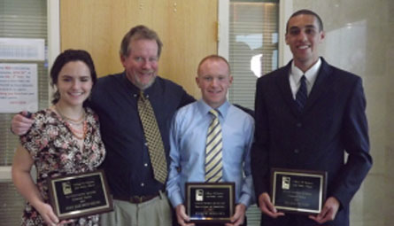 Dr. Brian O’Neill poses with outstanding students (from left to right): Mary Elizabeth Keeney (Outstanding Senior), Dr. O’Neill, Joseph Moloney (Outstanding Graduate Student), Adam Heath (Outstanding Junior).