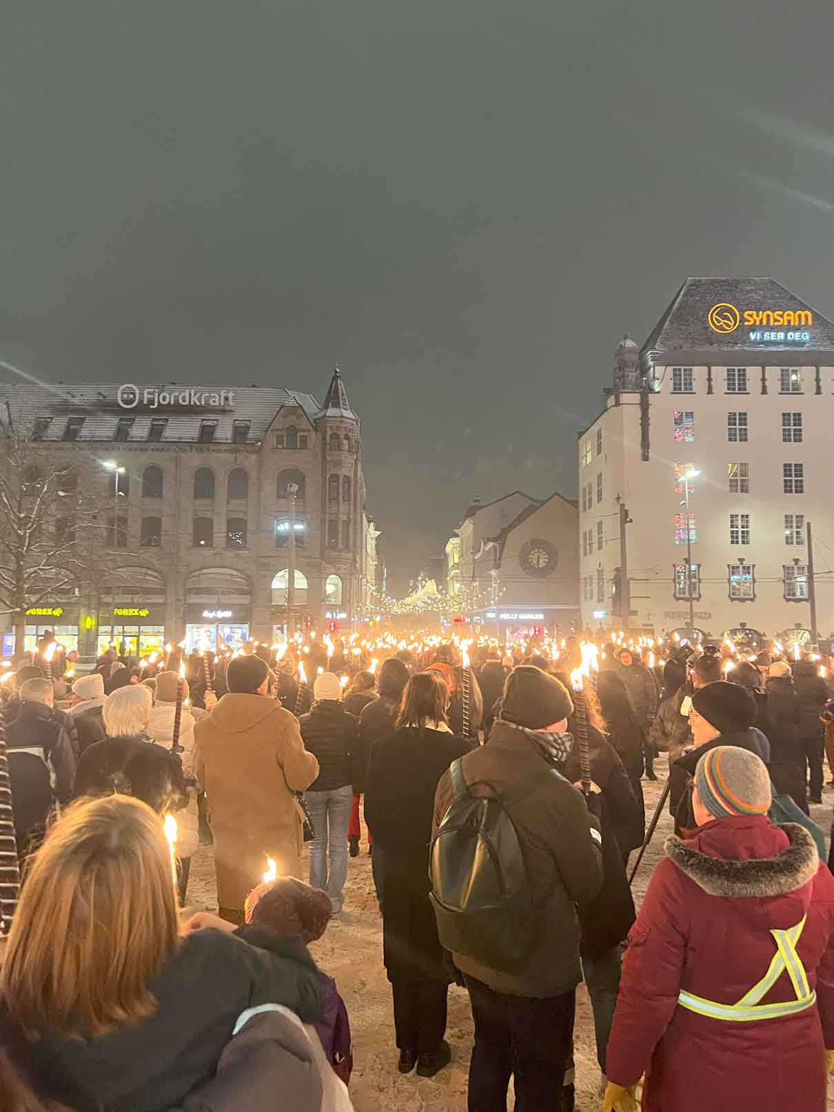 large group outside with candles