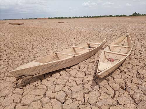 Boats in dry desert