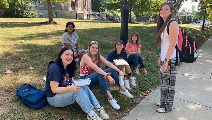 Students sitting on the grass