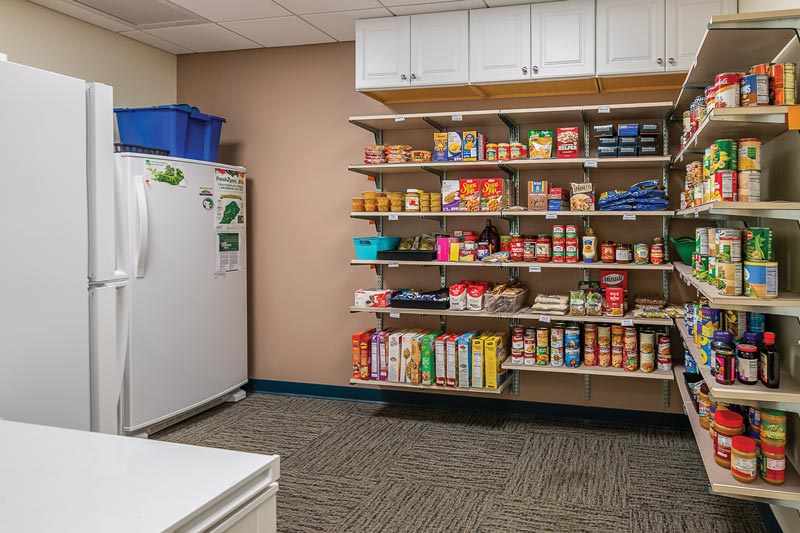 Pantry showing shelves of canned, jarred, and boxed food