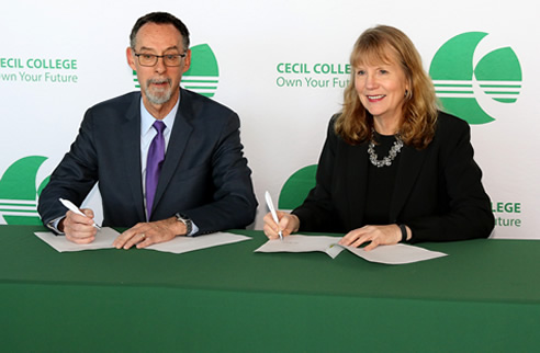 West Chester University President Dr. Christopher M. Fiorentino and Cecil College President Dr. Mary Way Bolt sign a new articulation agreement that allows a smooth transition for students who graduate from Cecil College’s Early College Academy (ECA) program to complete a four-year degree at West Chester University.