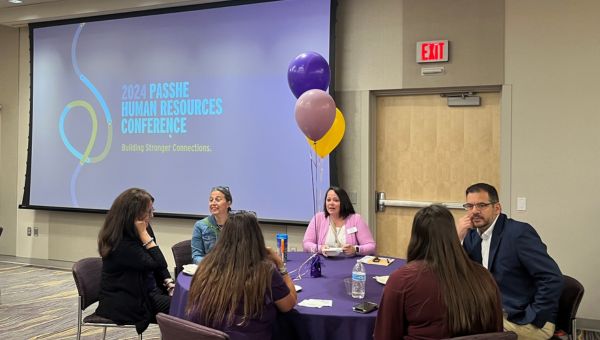 Conference attendees at a networking lunch during the 2024 PASSHE Human Resources conference.