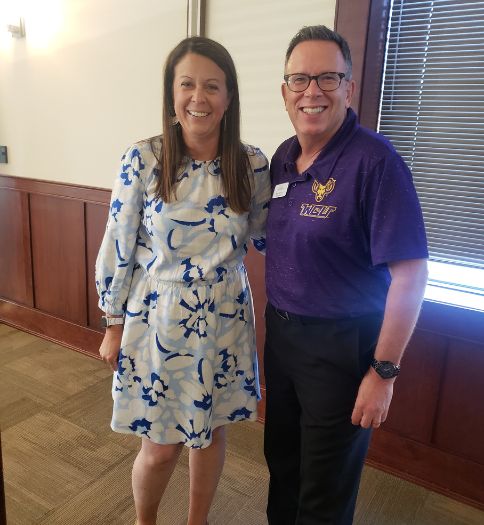 Scott Sherman, WCU’s executive director of human resources, with keynote speaker Dr. Jayme Trogus from WCU's Office of Wellness Promotion