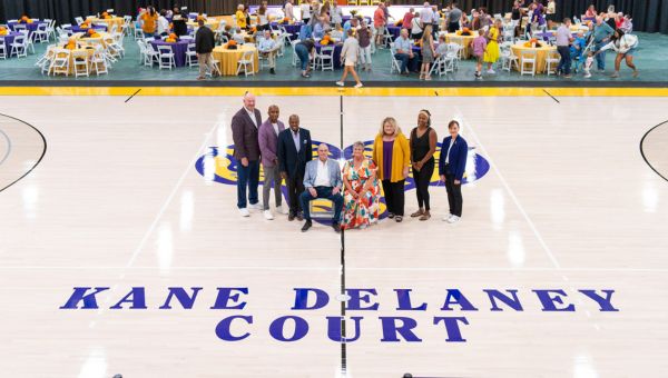 Pictured (l to r) at the Kane DeLaney Court ceremony are Terry Beattie, Director of Athletics; Damien Blair, Head Coach, Men's Basketball; Dr. Zebulun Davenport, Vice President for University Advancement & External Affairs; Dick DeLaney, former Men's Basketball Coach and Honoree; Deirdre Kane, former Women's Basketball Coach and Honoree; Dr. Laurie Bernotsky, President, West Chester University; Kiera Wooden, Head Coach, Women's Basketball; Deb Cornelius, Executive Director, WCU Foundation