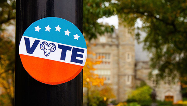 Vote sticker on a light poll