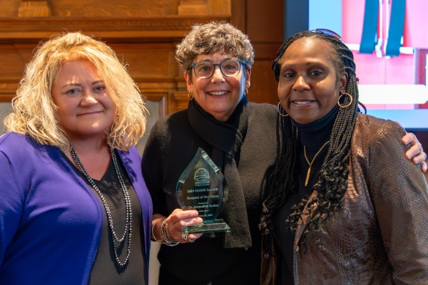 Pictured at the Keeper of the Flame Award ceremony on campus are (L-R) Dr. Laurie Bernotsky, president, Dr. Jackie Hodes, honoree and HEPSA department chair, and Dr. Tracey Robinson, vice president for Diversity, Equity, and Inclusion & chief diversity & inclusion officer.