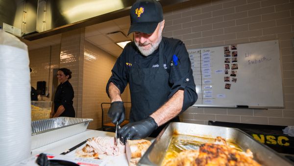 Chef helping prep food