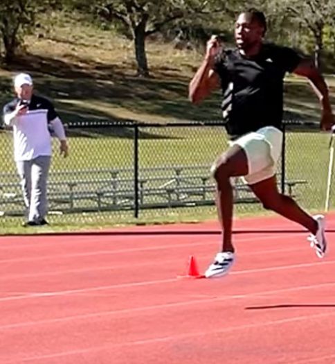 Dr. Ken Clark ’09, assistant professor of kinesiology, consults with Paris Olympics 100 meters gold medalist Noah Lyles Dr. Ken Clark ’09, assistant professor of kinesiology, consults with Paris Olympics 100 meters gold medalist Noah Lyles